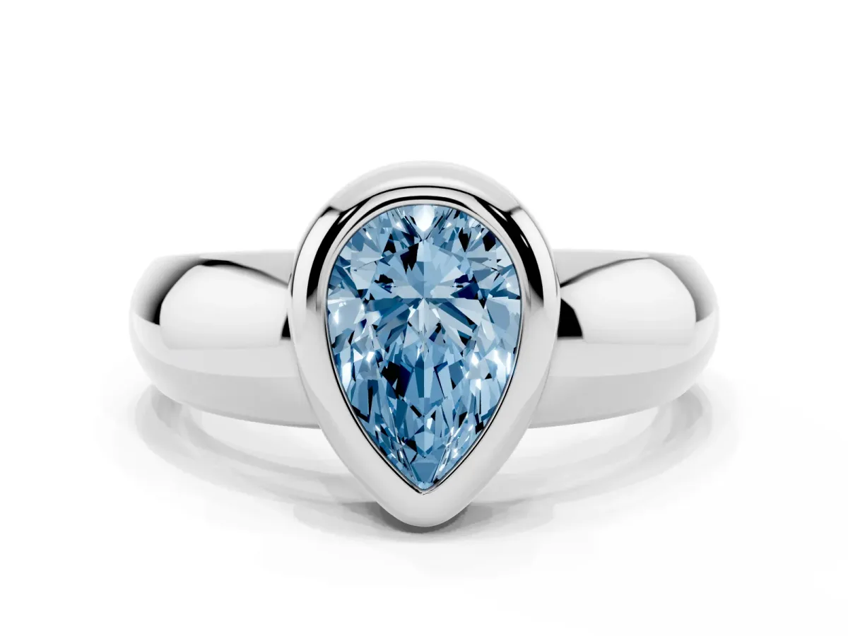 Fancy Blue Bezel Set Pear Cut Solitaire Ring with Wide Band Silver