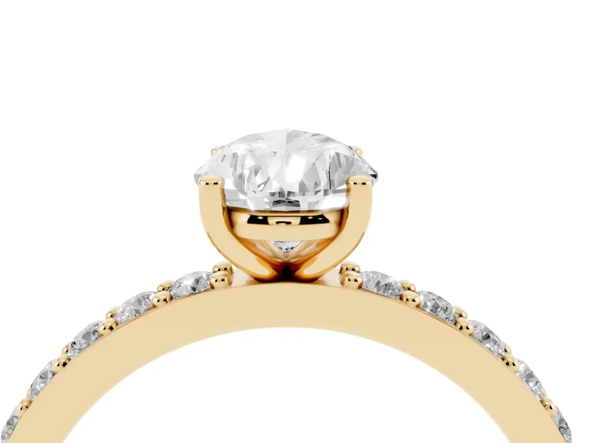 Pear Cut Cut Diamond Solitaire with Pave Band and Four-Prong Setting Yellow gold