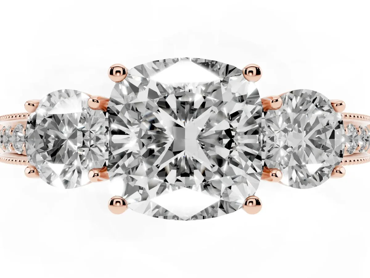 Cushion Cut Three-Stone Diamond Ring with Pavé Band and Four-Prong Setting Rose gold
