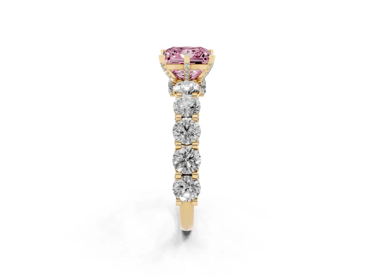 Fancy Pink Princess Cut Diamond Side Stone Engagement Ring with Four-Prong Setting Yellow gold