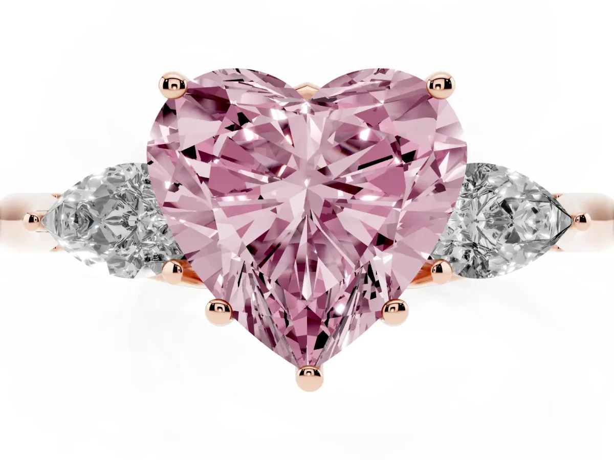 Fancy Pink Three-Stone Heart Cut Brilliant Diamond Solitaire Ring with Tapered Band and Four-Prong Setting Rose gold