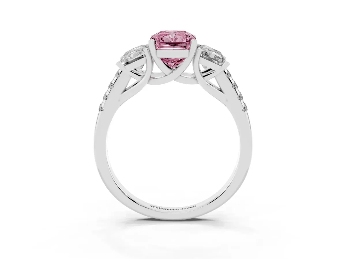Fancy Pink Three-Stone Radiant Cut Diamond Ring with Round Pavé Band and Prong Setting Silver