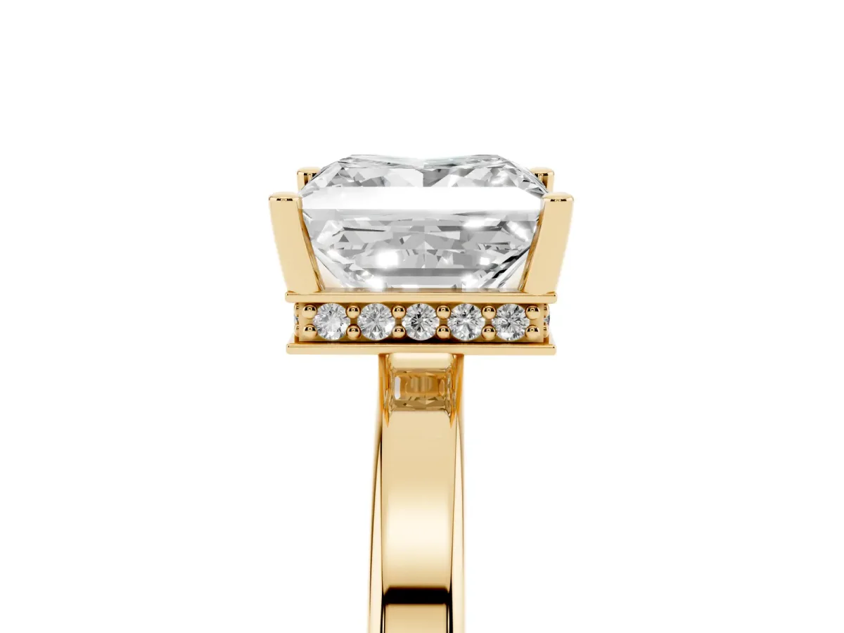 Princess Cut Cut Solitaire Engagement Ring with Four-Prong Setting on a Classic Band Yellow gold