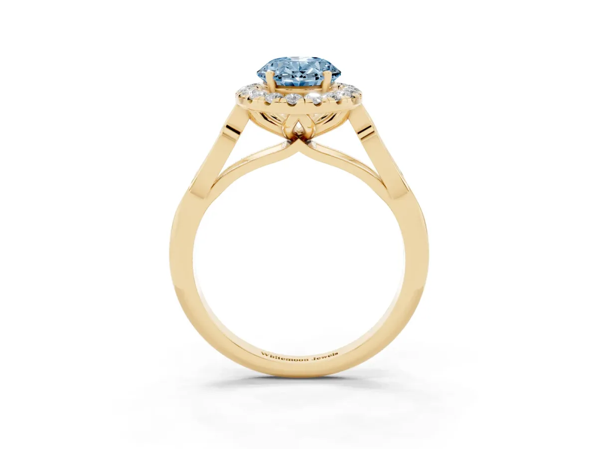 Fancy Blue Oval Cut Halo Diamond Engagement Ring with Filigree Band and Four-Prong Setting Yellow gold