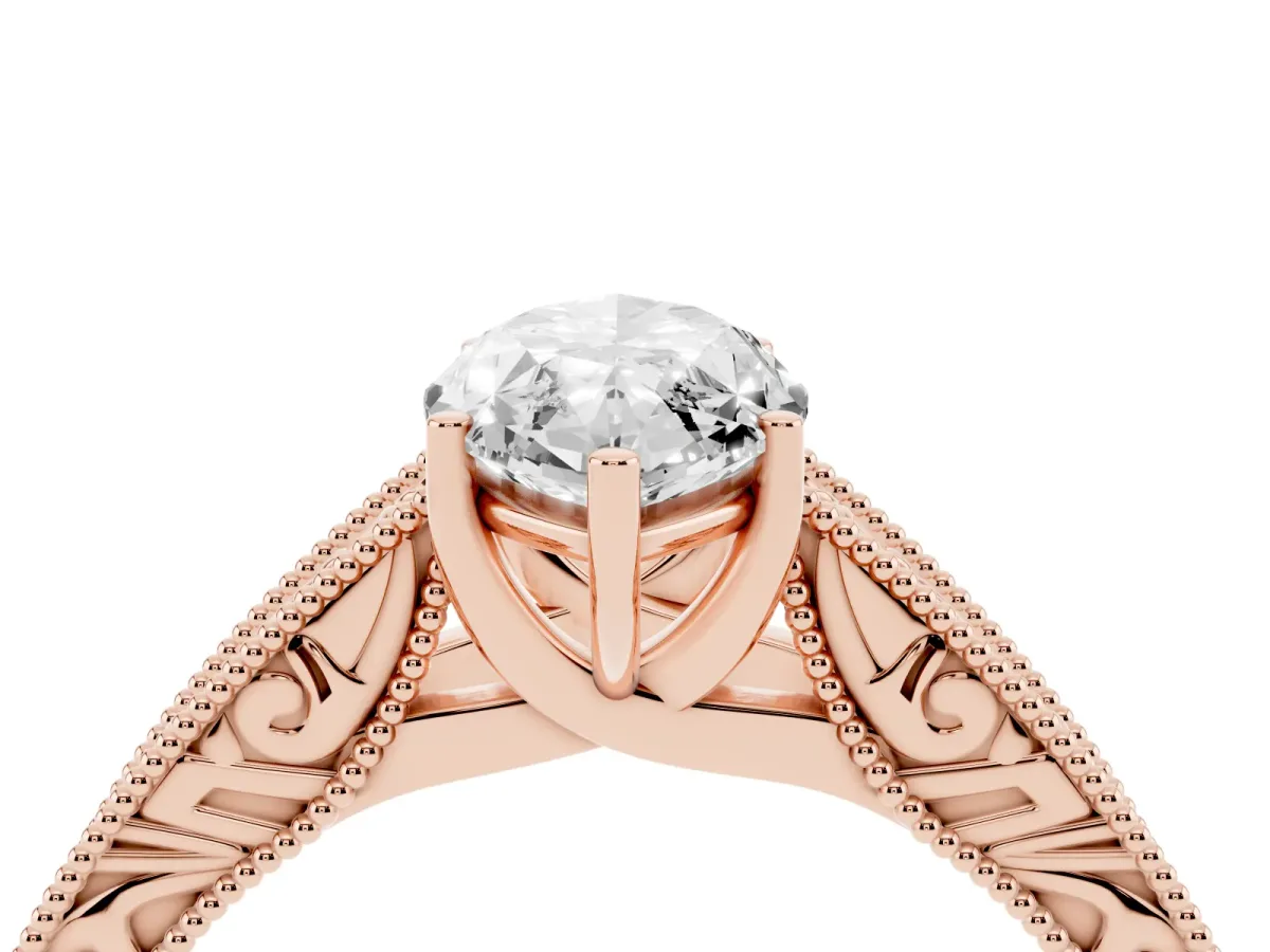 Marquise Cut Diamond Solitaire Ring with Engraved Band and Four-Prong Setting Rose gold