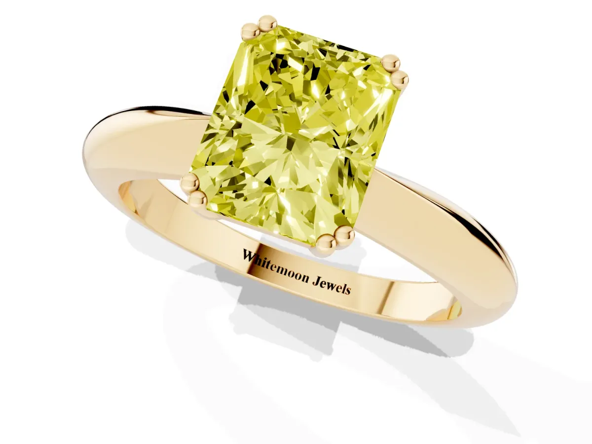 Fancy Yellow Radiant Cut Cut Solitaire Engagement Ring with Tapered Band and Four-Prong Setting Yellow gold