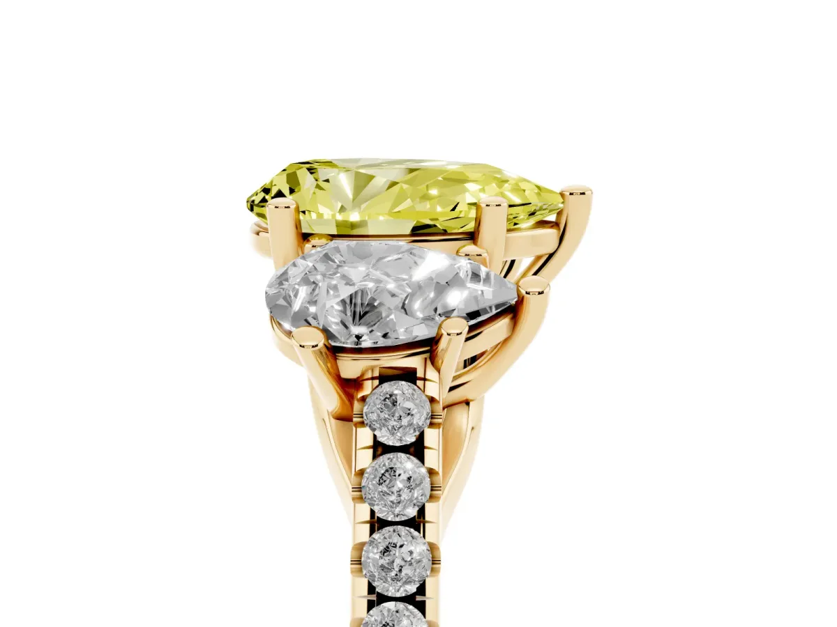 Fancy Yellow Three-Stone Pear Cut Diamond Ring with Round Pavé Band and Prong Setting Yellow gold