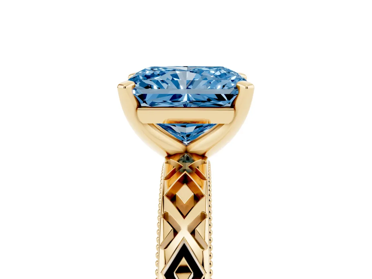 Fancy Blue Radiant Cut Solitaire Diamond Ring with Milgrain and Black Enamel X Pattern Band Yellow gold