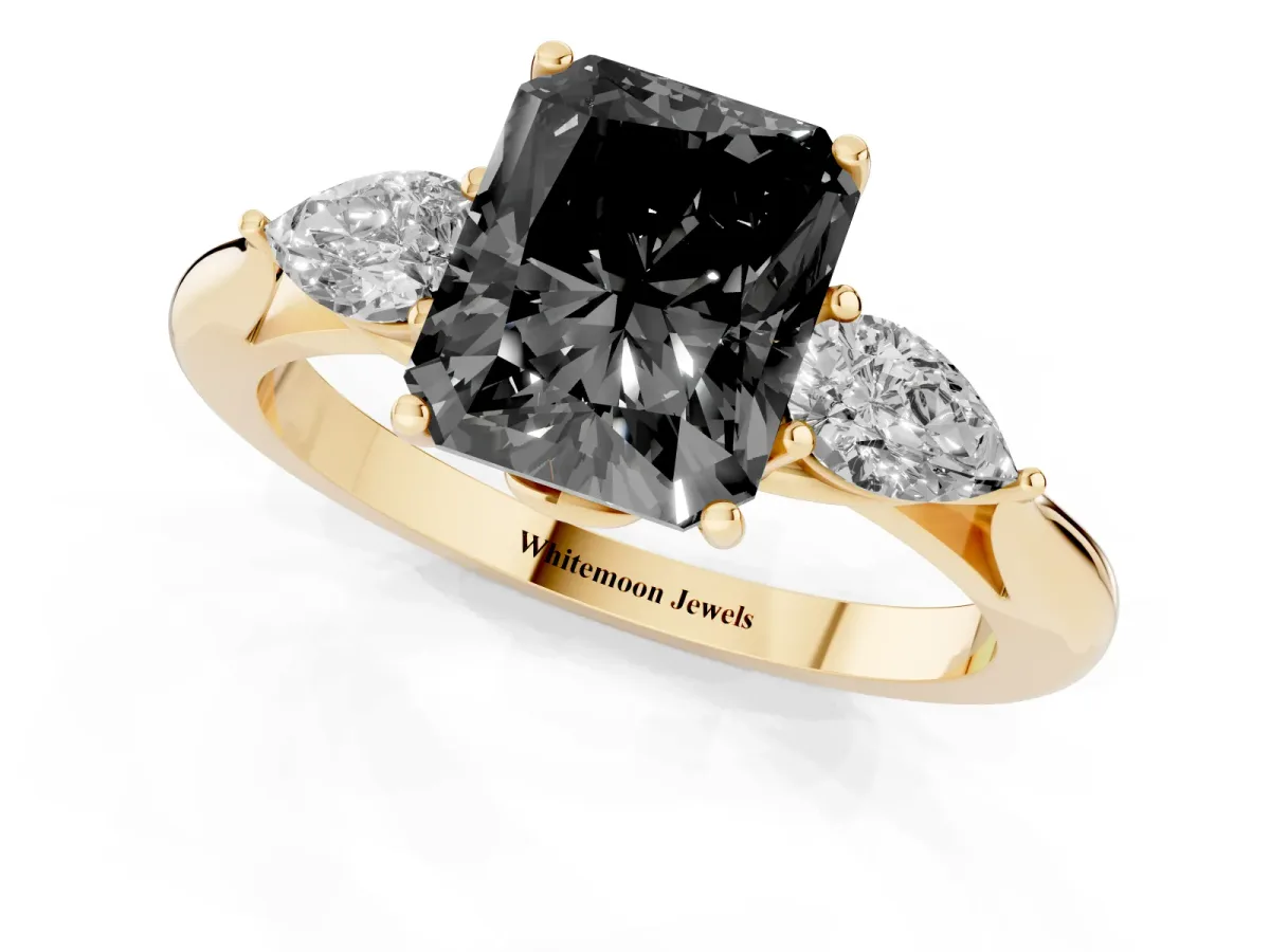 Fancy Black Radiant Cut Diamond Three-Stone Ring with Pear Side Stones and Prong Setting Yellow gold