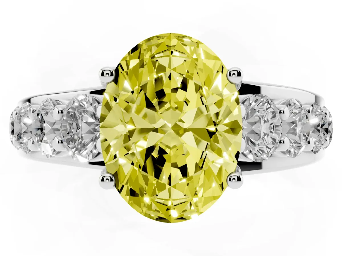 Fancy Yellow Oval Cut Diamond Engagement Ring with Pavé Band and Four-Prong Setting Silver