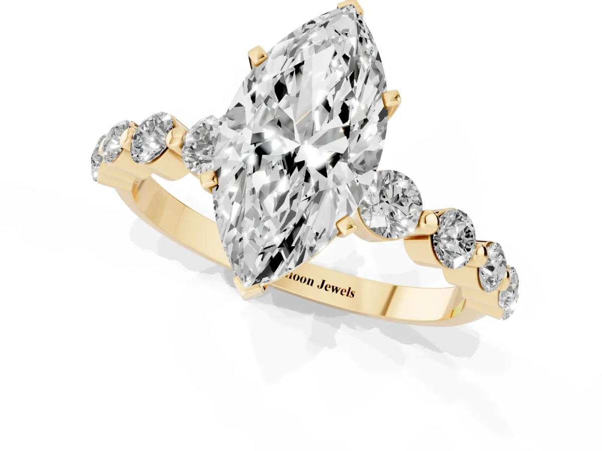 Marquise Cut Solitaire Diamond Ring with Pave Band and Four-Prong Setting Yellow gold