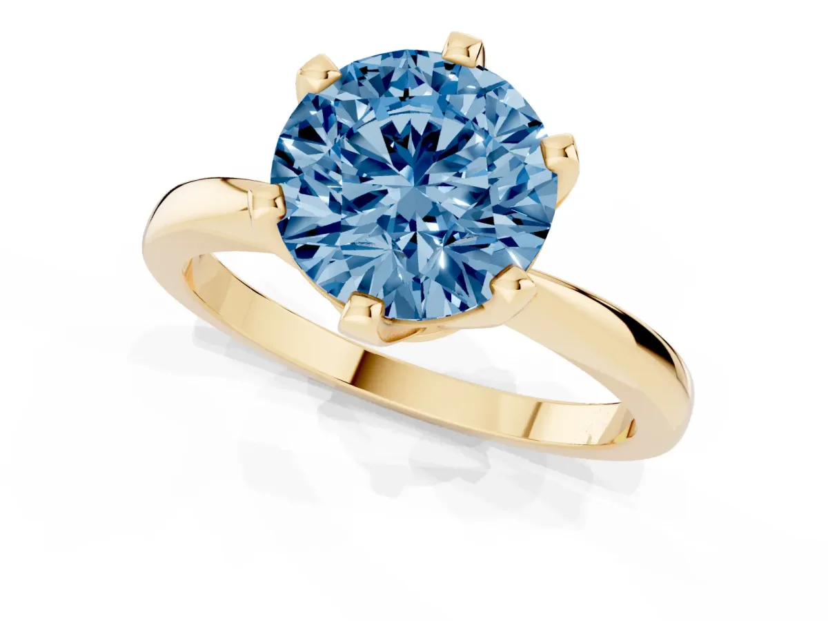 Fancy Blue Round Cut Solitaire Engagement Ring with Six-Prong Setting and Tapered Band Yellow gold