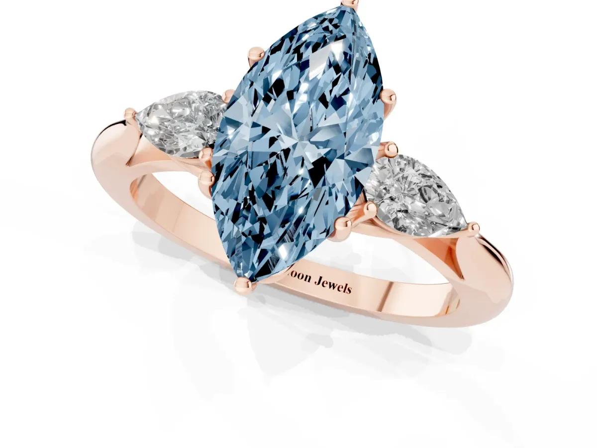 Fancy Blue Three-Stone Marquise Cut Brilliant Diamond Solitaire Ring with Tapered Band and Four-Prong Setting Rose gold