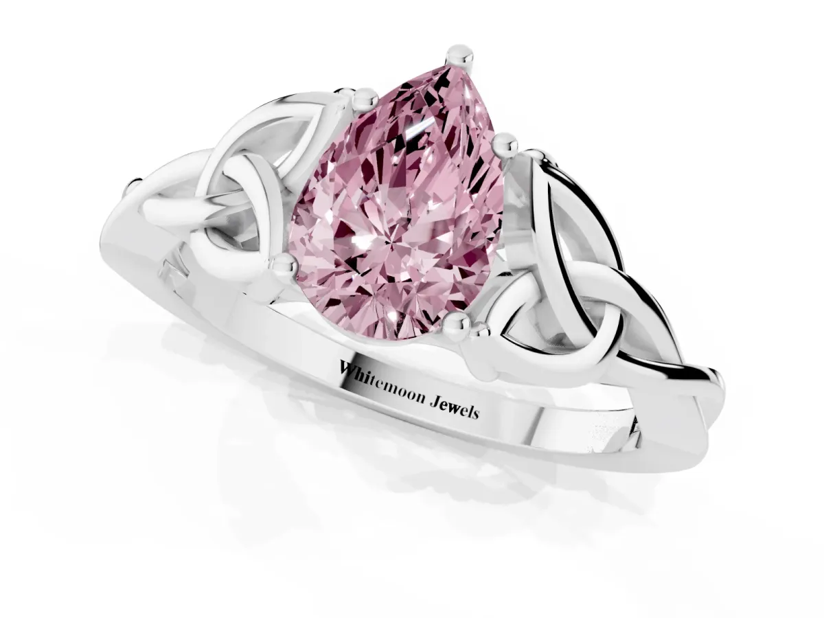 Fancy Pink Pear Cut Diamond Solitaire Engagement Ring with Celtic Knot Band and Four-Prong Setting Silver