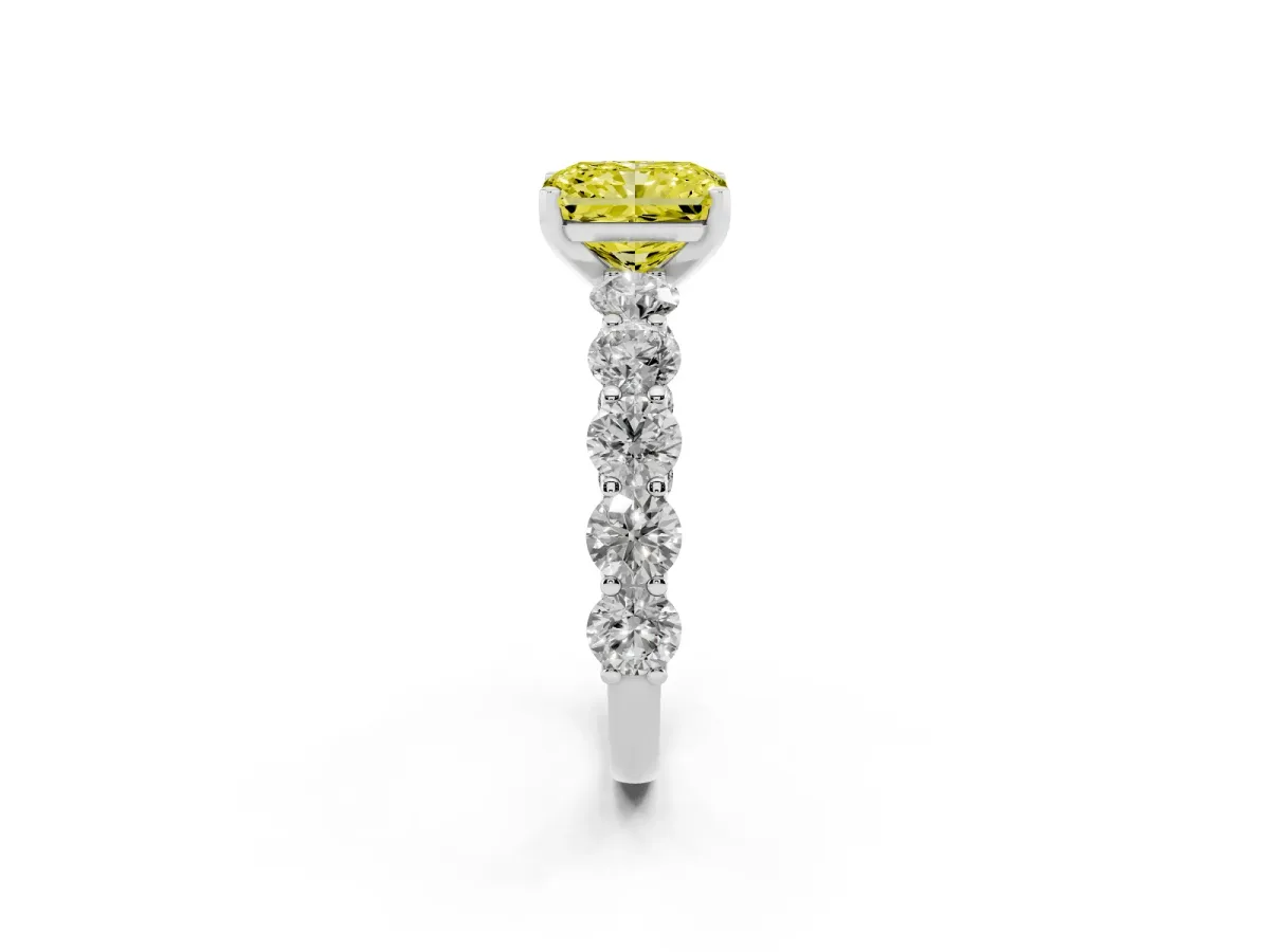 Fancy Yellow Radiant Cut Diamond Prong Setting with Side Stones on a Pave Band Silver