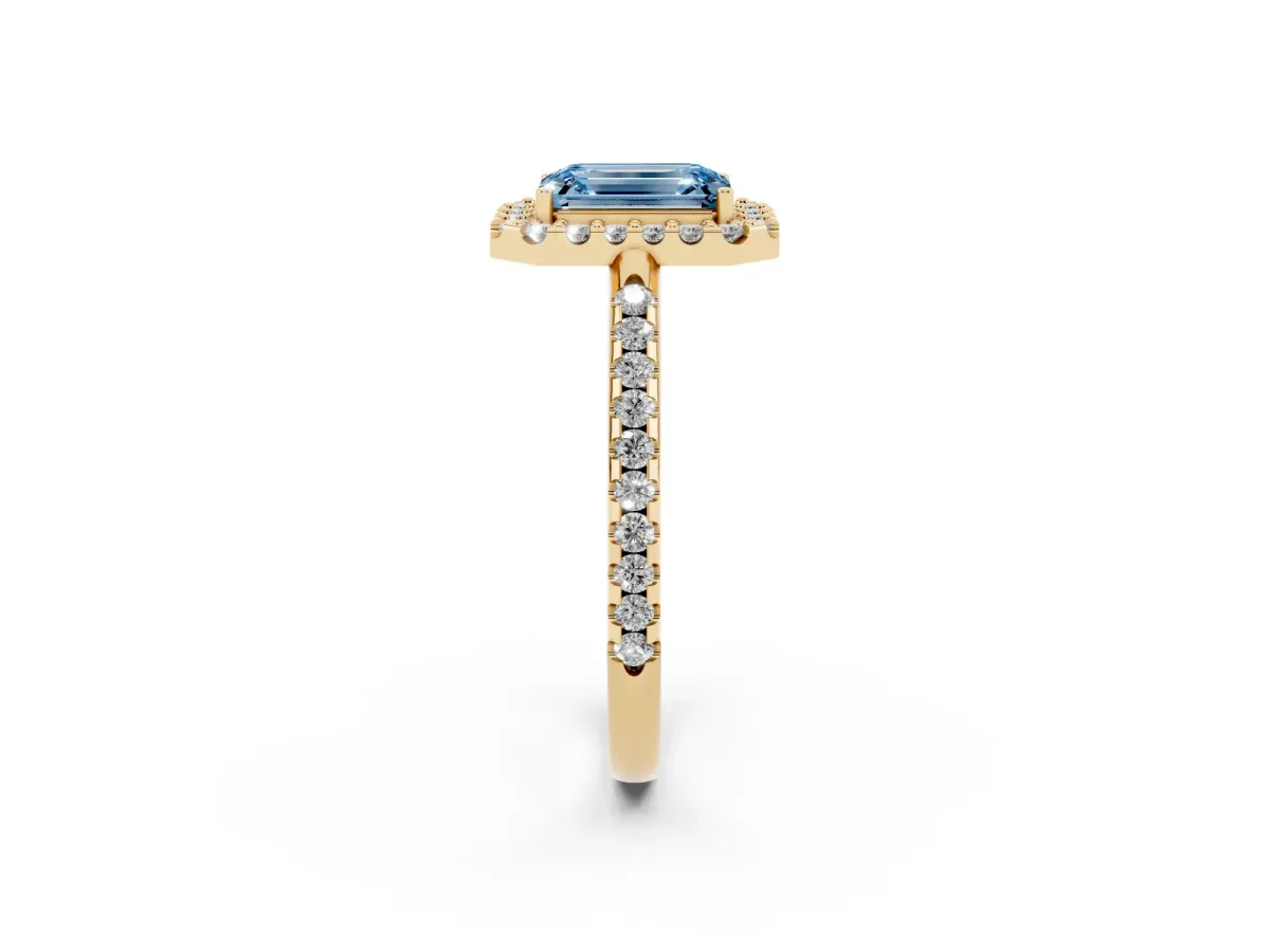 Fancy Blue Emerald Cut Diamond Pavé Halo Ring with Four-Prong Setting Yellow gold