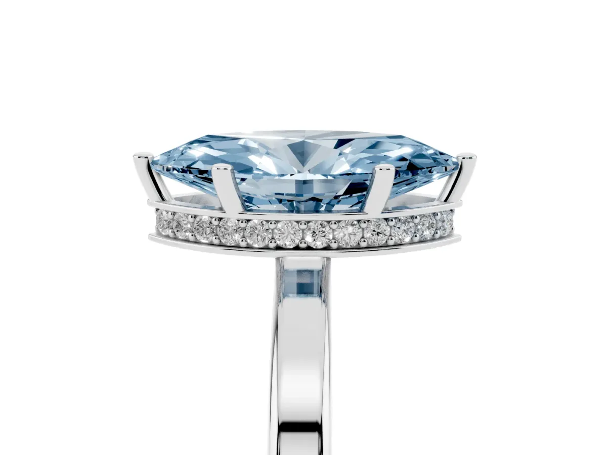 Fancy Blue Marquise Cut Cut Solitaire Engagement Ring with Four-Prong Setting on a Classic Band Silver