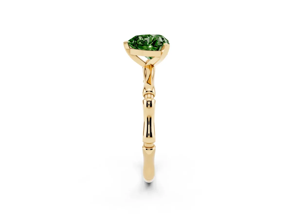 Fancy Green Heart Cut Solitaire Diamond Ring with Bamboo Band and Four-Prong Setting Yellow gold