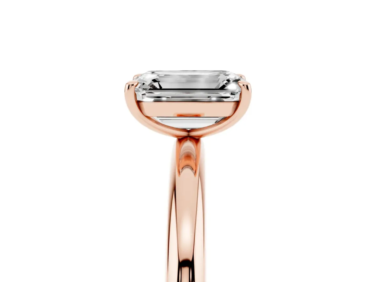 Emerald Cut Solitaire Diamond Ring with Four-Prong Setting on a Plain Band Rose gold