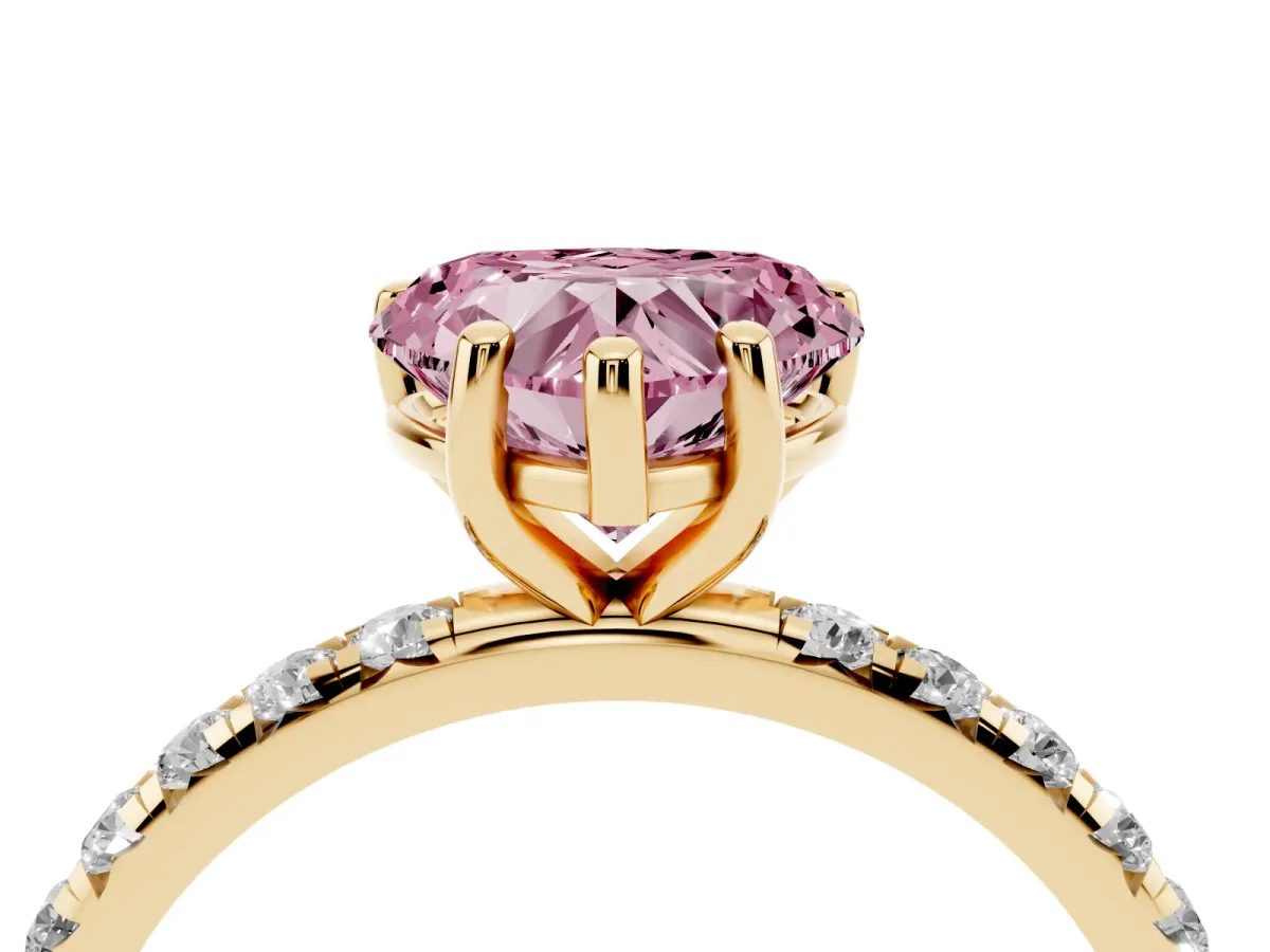Fancy Pink Heart Cut Cut Diamond Solitaire Ring with Micro Pave Band and Four Prong Setting Yellow gold