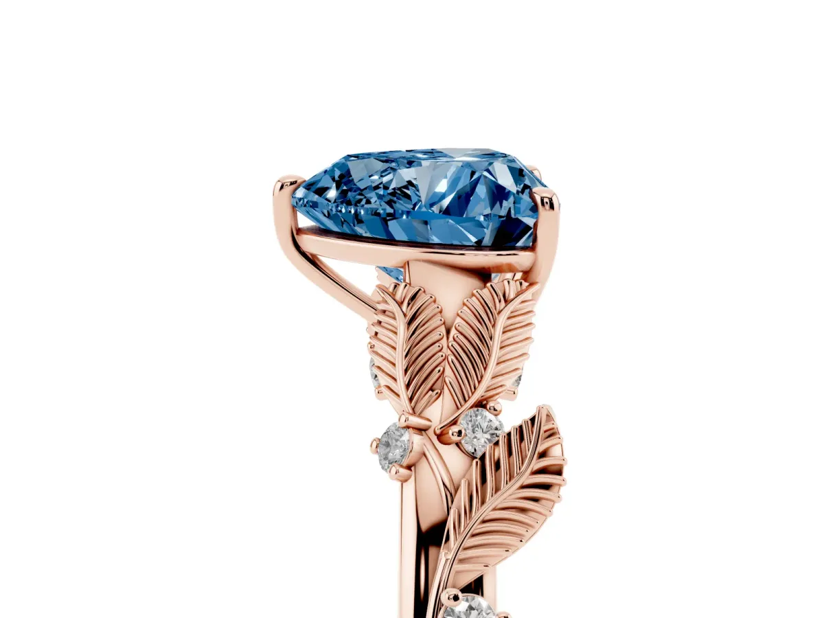 Fancy Blue Heart Cut Diamond Solitaire Ring with Leaf Motif Band and Four-Prong Setting Rose gold