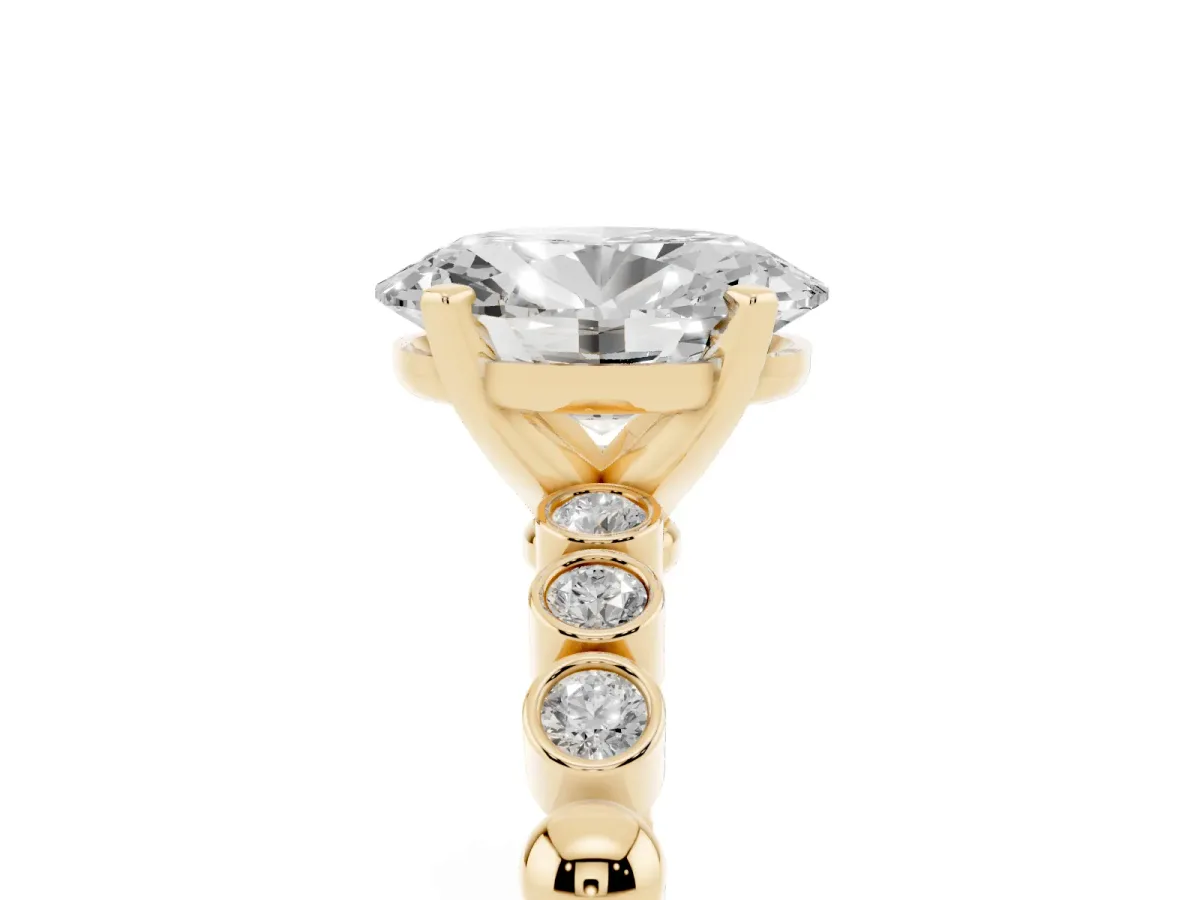 Oval Cut Solitaire Bezel Accent Diamond Engagement Ring with Beaded Band and Four-Prong Setting Yellow gold