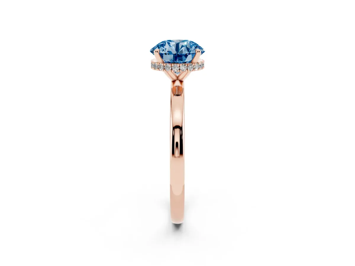 Fancy Blue Round Cut Solitaire Engagement Ring with Cathedral Band and Four-Prong Setting Rose gold