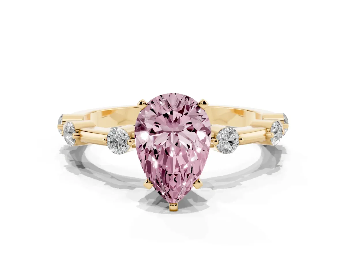 Fancy Pink Pear Cut Solitaire Diamond Ring with Bezel Set Side Stones and Prong Setting Yellow gold