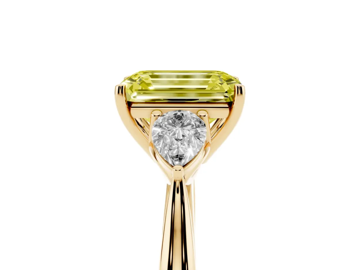 Fancy Yellow Emerald Cut Diamond Three-Stone Ring with Pear Side Stones and Prong Setting Yellow gold