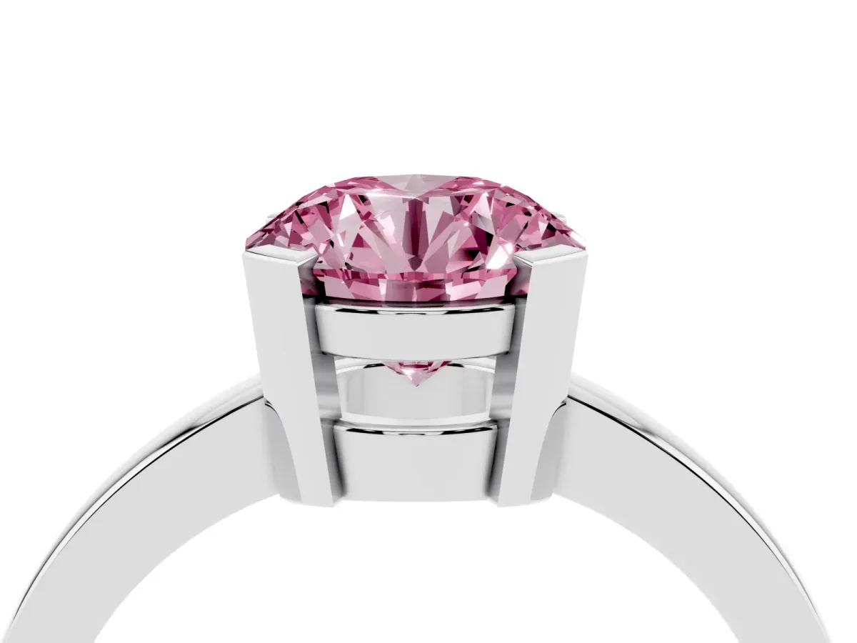 Fancy Pink Round Cut Cut Solitaire Ring with Four-Prong Setting and Classic Band Silver