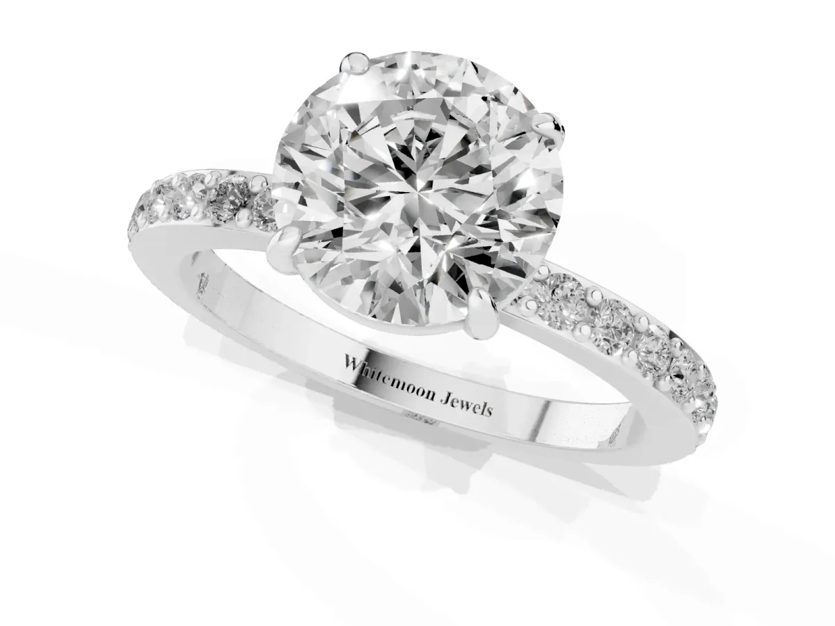 Round Cut Diamond Pavé Engagement Ring with Round Accents and Prong Setting Platinum