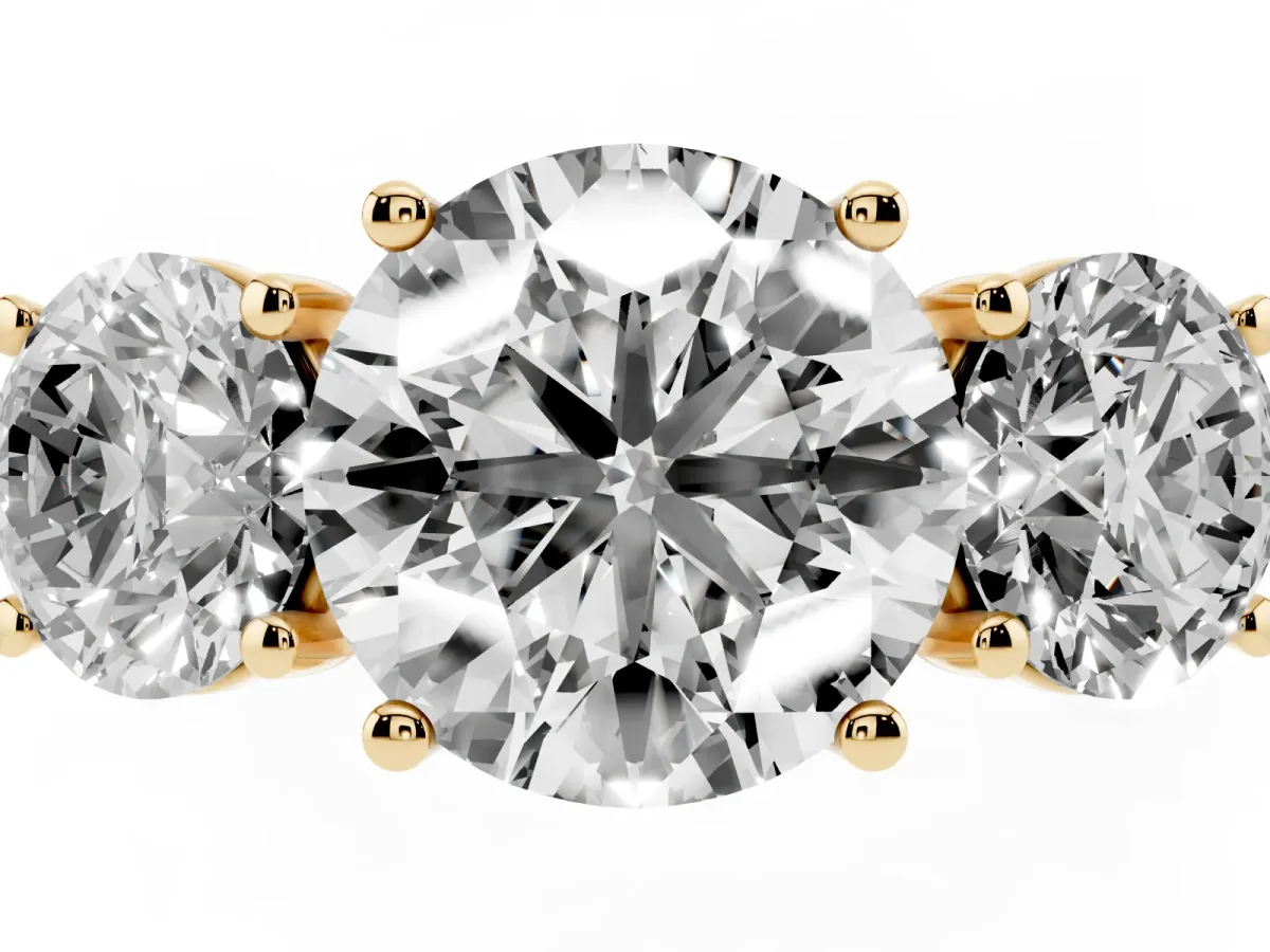 Three-Stone Round Cut Diamond Ring with Round Pavé Band and Prong Setting Yellow gold
