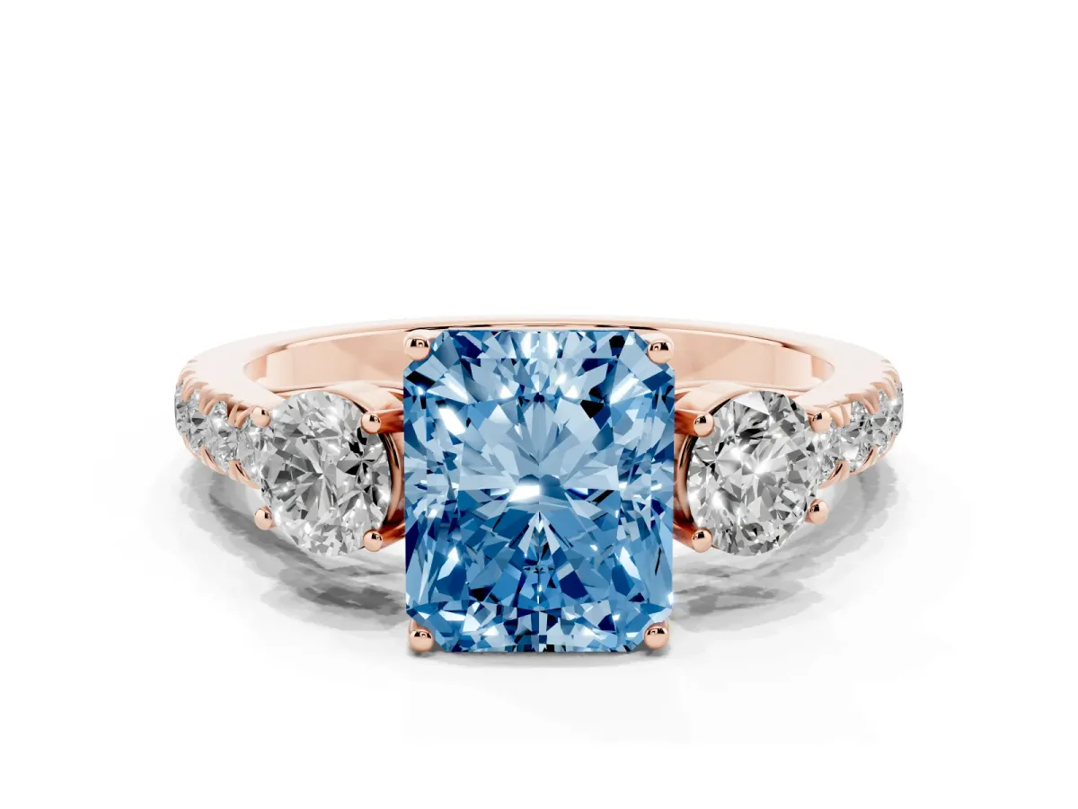 Fancy Blue Radiant Cut Cut Diamond Three-Stone Ring with Round Side Stones and Pavé Band Rose gold