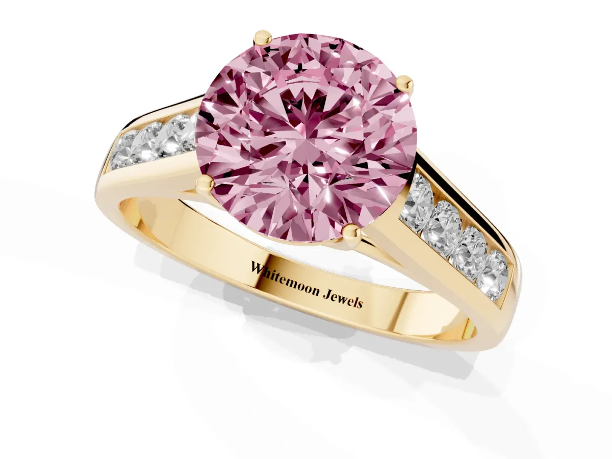 Fancy Pink Round Cut Brilliant Channel-Set Solitaire Ring with Four-Prong Setting Yellow gold