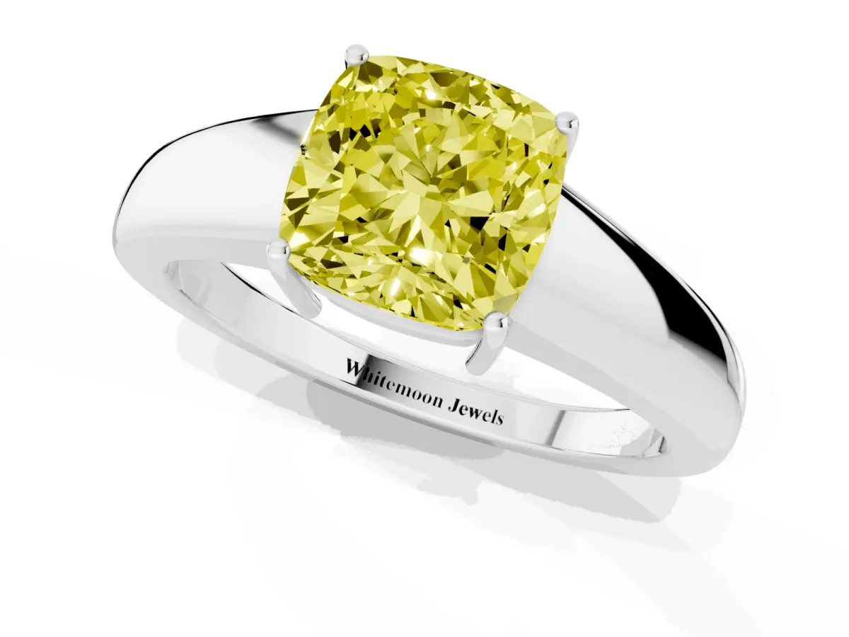 Fancy Yellow Cushion Cut Solitaire Diamond Ring with Tapered Band and Four-Prong Setting Silver