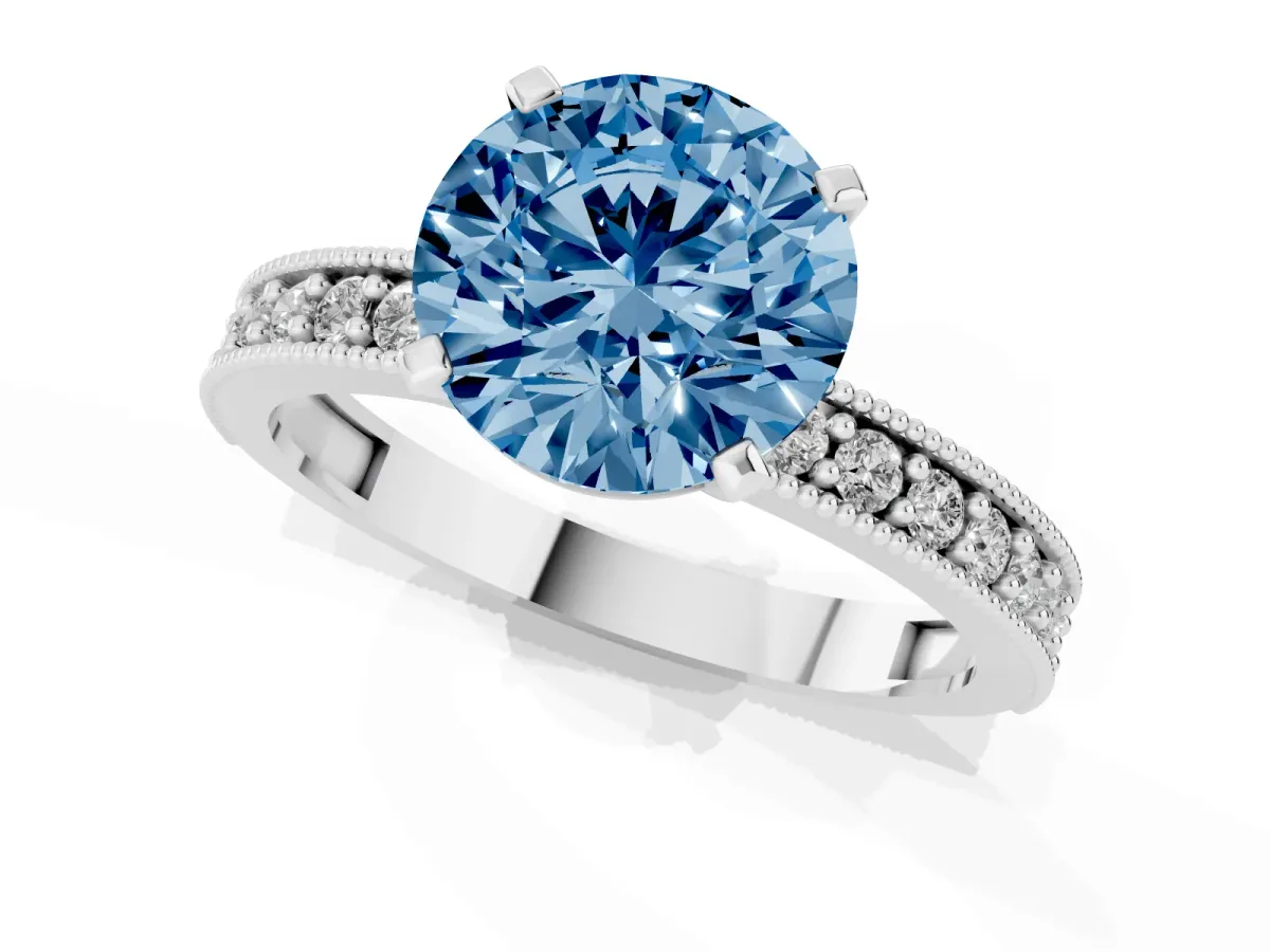 Fancy Blue Round Cut Diamond Milgrain Pavé Engagement Ring with Four-Prong Setting Silver