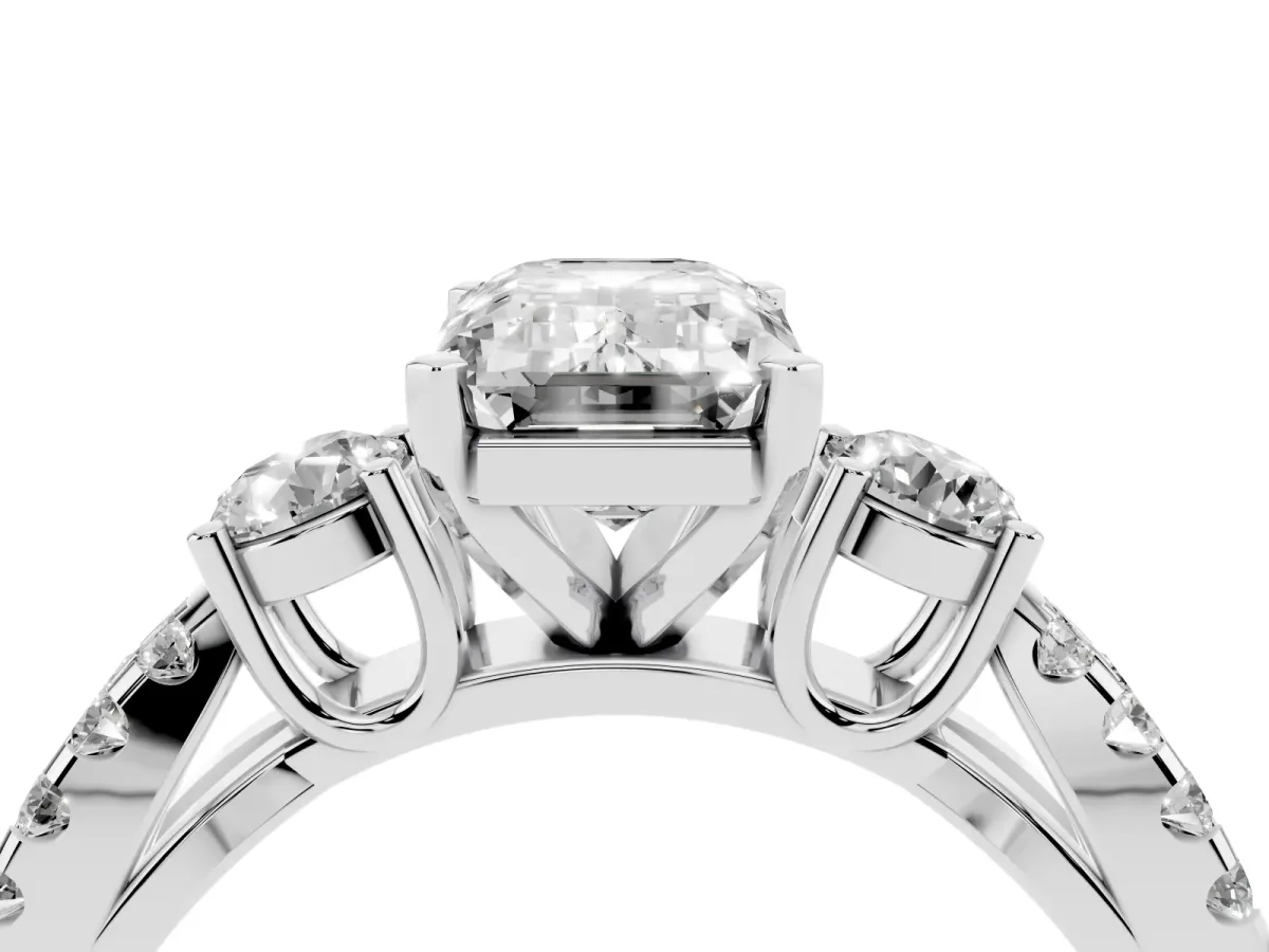 Emerald Cut Diamond Three-Stone Ring with Pavé Split Shank and Four-Prong Setting Silver