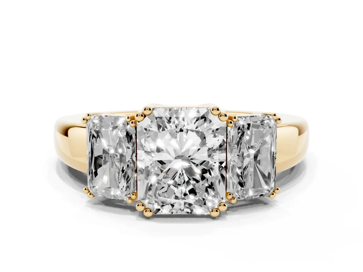 Three-Stone Radiant Cut Cut Diamond Ring with Channel Set Band and Four-Prong Setting Yellow gold