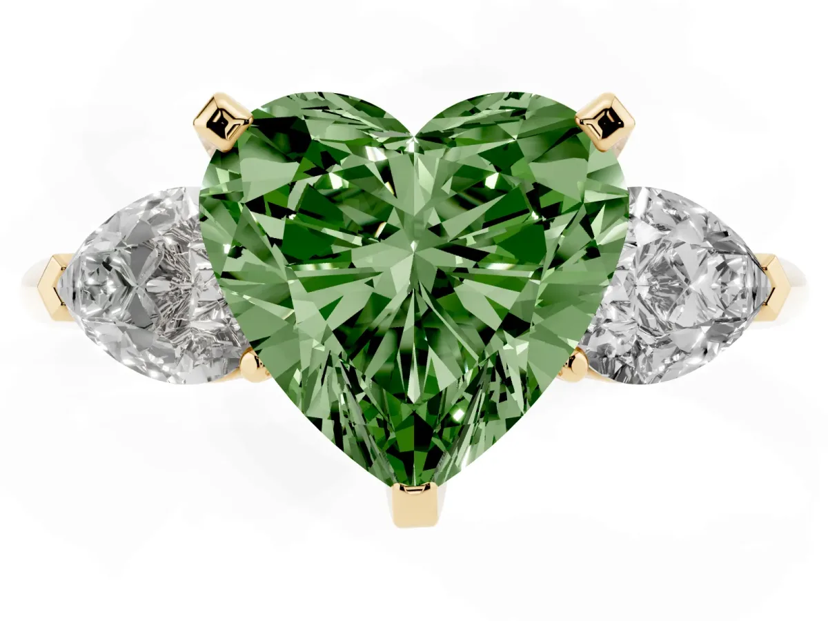 Fancy Green Three-Stone Heart Cut Diamond Ring with Pear Side Stones and Four-Prong Setting Yellow gold