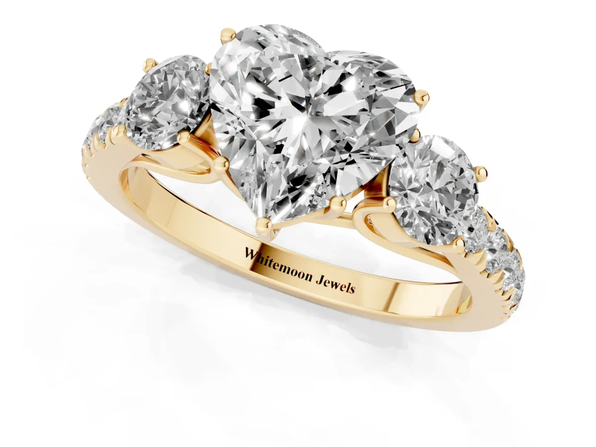 Heart Cut Cut Diamond Three-Stone Ring with Round Side Stones and Pavé Band Yellow gold