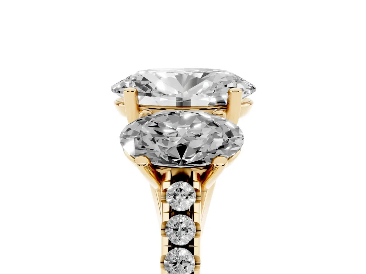 Three-Stone Oval Cut Diamond Ring with Round Pavé Band and Prong Setting Yellow gold
