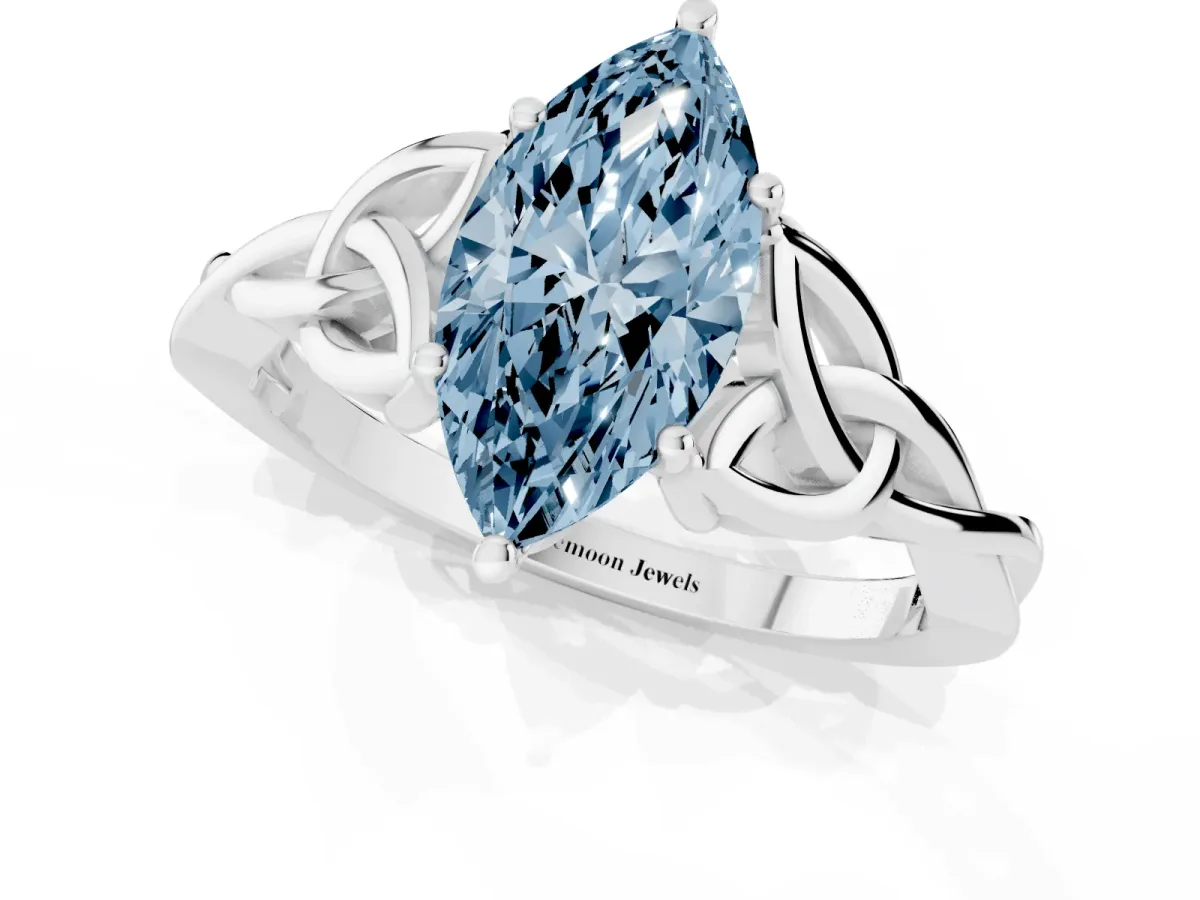 Fancy Blue Marquise Cut Diamond Solitaire Engagement Ring with Celtic Knot Band and Four-Prong Setting Platinum