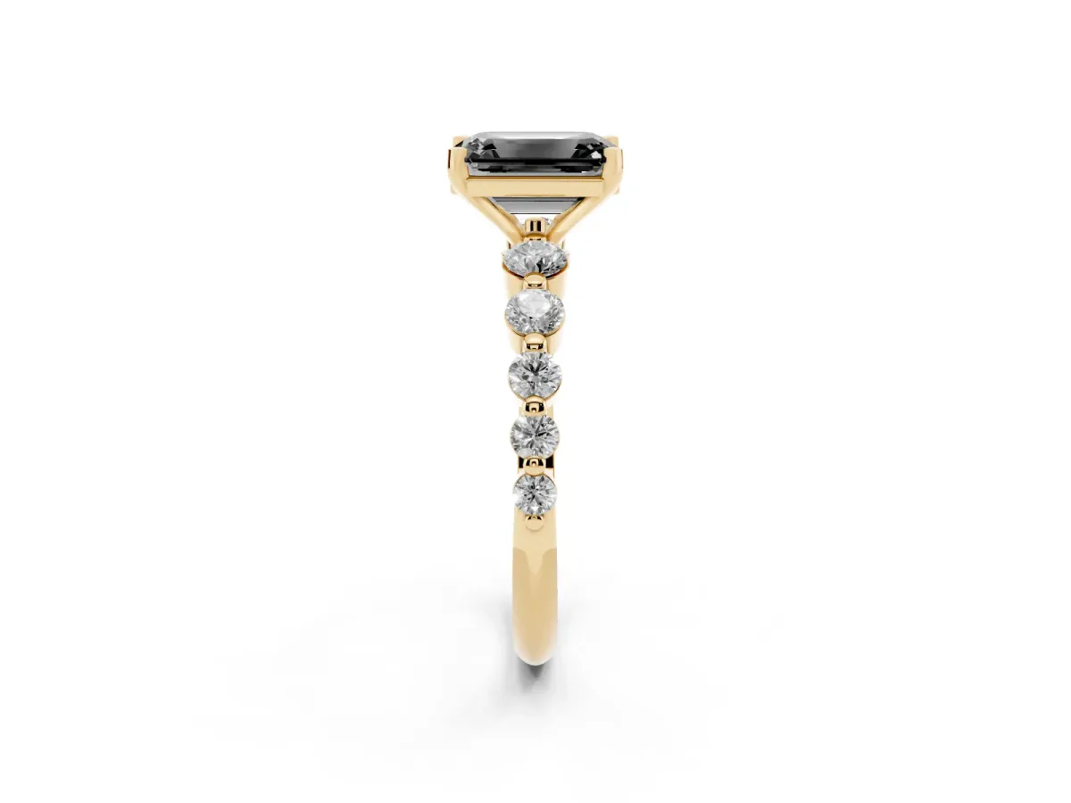 Fancy Black Emerald Cut Solitaire Diamond Ring with Pave Band and Four-Prong Setting Yellow gold