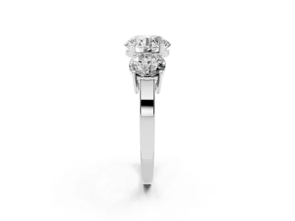 Three-Stone Round Cut Cut Diamond Engagement Ring with Flat Band and Four-Prong Setting Silver