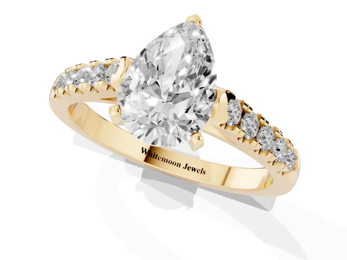 Pear Cut Diamond Pavé Band Solitaire Ring with Prong Setting Yellow gold