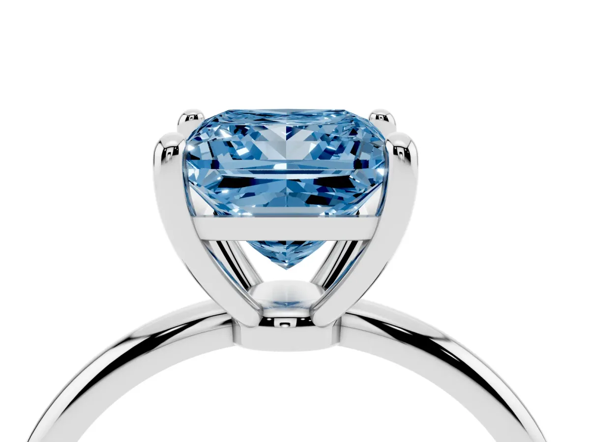Fancy Blue Princess Cut Solitaire Diamond Ring with 4-Prong Setting on a Classic Band Silver