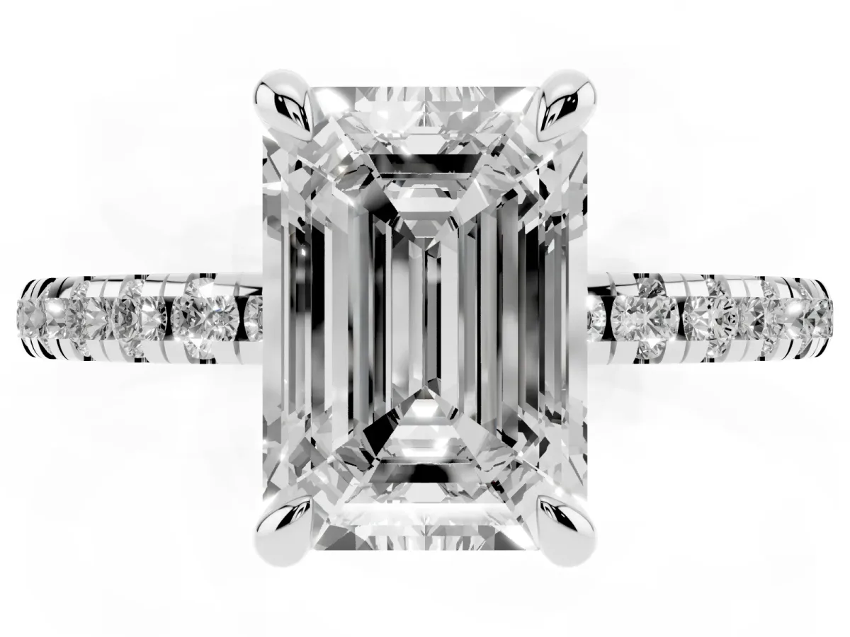 Emerald Cut Diamond Brilliant Solitaire Ring with Pavé Band and Four-Prong Setting White gold
