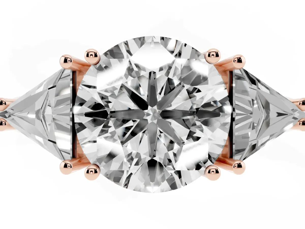 Three-Stone Round Cut Diamond Engagement Ring with Trillion Side Stones and Prong Setting Rose gold