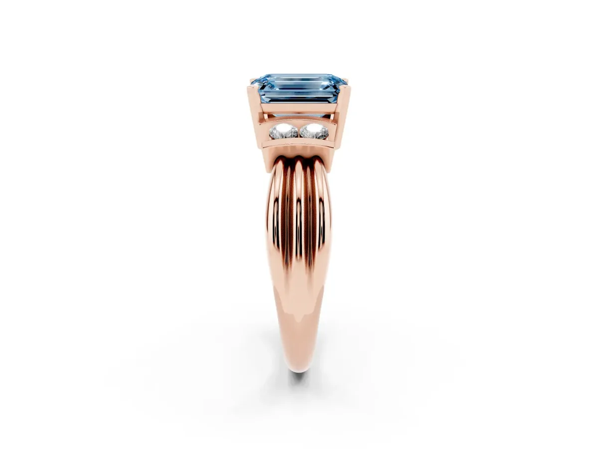 Fancy Blue Emerald Cut Cut Three-Stone Channel Set Ring with Bar Prongs Rose gold