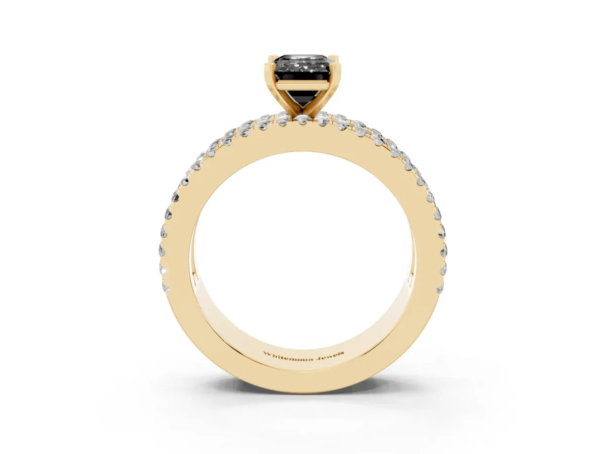 Fancy Black Emerald Cut Diamond Solitaire Ring with Pavé and Channel Set Band Yellow gold